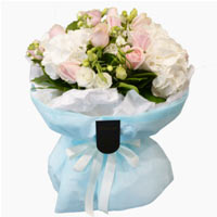 Artistic Collection of Pastel Flowers in Boxed Vase