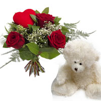 A grand example of a traditional red rose bouquet with fine baby's breath, long ...
