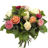 A distinct grouping of pink and cerise roses flawlessly bound to roses of more s...