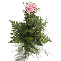 Bouquet with pink rose and greenery. It is believed that pink flowers come with ...