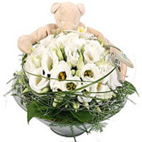 A cute decoration for baby with beautiful beige bunny that is both cuddly teddy ...