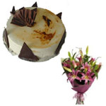Delightful Party Special Cake and Lilies