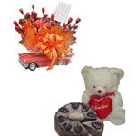Lavish Candy Bouquet with an Adorable Teddy and Chocolate Cake