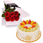 Fresh Fruit Cake and Red Roses