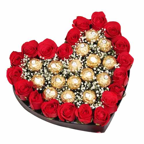 Heart shapped ferrero chocolates with red roses