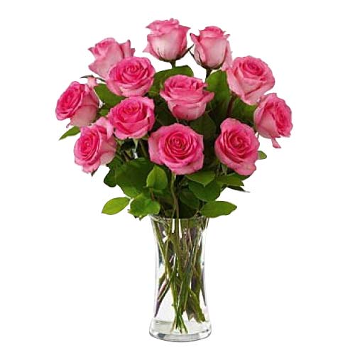 1 dozen pink roses in glass vase
