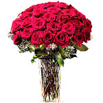 Two dozen red roses in a vase.......  to Baguio_Philippine.asp