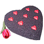 Yummy chocolate cake. Heart shape choco cake on to......  to Roxas