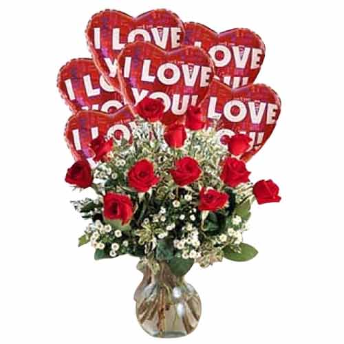 One dozen red roses in a vase with 6 pcs I love yo......  to Calbayog