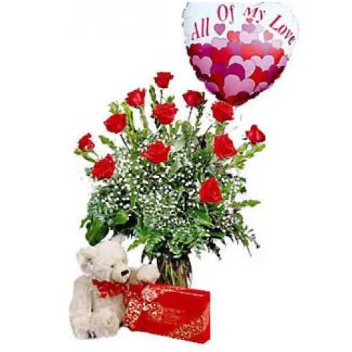 1 dozen red roses in a vase with balloon,bear & ch......  to Cavite