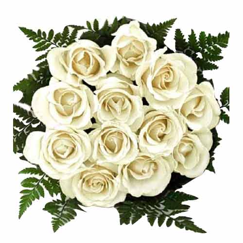 One dozen white roses in a bouquet.......  to Dapitan