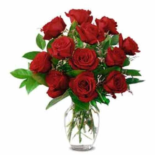 1 Dozen Roses in a Glass Vase w/ greens and filler