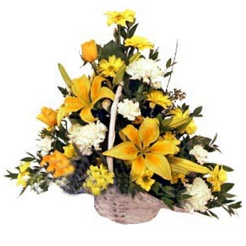 One-sided arrangement in a basket featuring lovely......  to Santiago