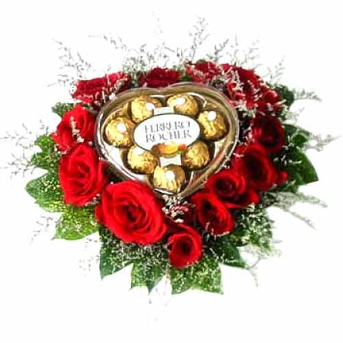 Heart shapped ferrero chocolates with red roses in......  to Dagupan