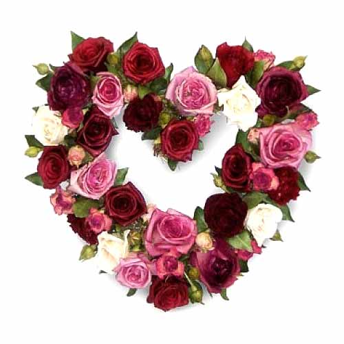 Red and pink roses in a heart shape basket.......  to Batangas