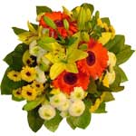 Thank to its warmed colours and natural flowers, this is an ideal bouquet to che...
