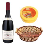 An impeccable Basket of Wine with Cheese