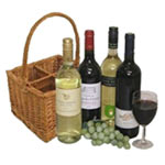 Charming Basket of 3 Wine Bottles and Grapes