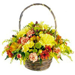 Basket arrangement of mixed seasonal flowers...