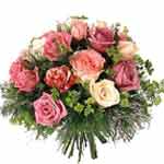 Bouquet of mixed and pastel coloured roses. small and medium sized buds. ...