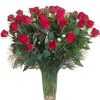 A sumptuous bouquet of 37 red roses and greenery that will make the right impres...