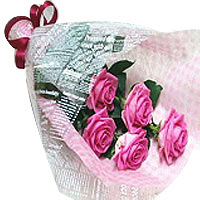 Offers this gorgeous bouquet with 5 pink roses, Gypsophila and fern. Perfect com...