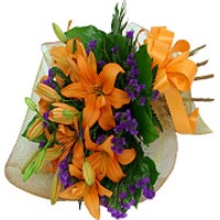 Bouquet of orange lilies in white coat . Virgin is...