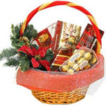 A gift basket of candy and whiskey Johnnie Walker ...