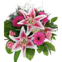 The stunning composisiton of lilies, roses, gerber......  to Engels