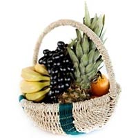This Basket includes Pineapple, grapefruits, orang......  to Novocheboksarsk