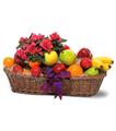 Apples, oranges & Grapes with flower arrangem ......