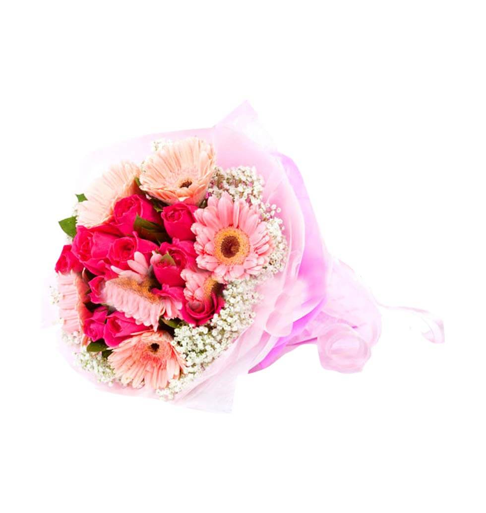 A bouquet of pink gerbera daisies and pink roses a...