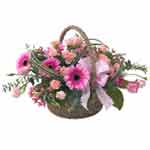 Captivating Tickled Pink Flower Basket