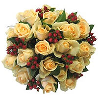Cream Roses, Hypericum and green filler wrapped in......  to Grahamstown_SouthAfrica.asp