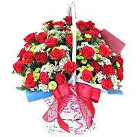 Red Roses with seasonal in a basket