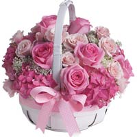 Pink Roses with seasonal flowers in basket