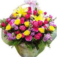 Mix seasonal flowers in basket