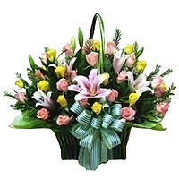A traditional basket of Pink Lilies, Pink & Yellow......  to Seoul