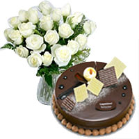 Enigmatic Energy Booster Combo Offer of Tasty Dark Chocolate Cake and Charming Bouquet of 20 White Roses