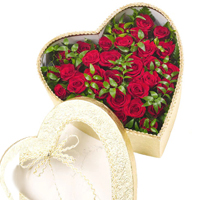 Sophisticated Display of 50 Red Roses in Heart Shaped Box