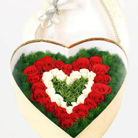 Ravishing Display of 50 Red N White Roses in Heart Shape Box