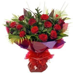 Passionate Bouquet of 12 Red Roses with Foliage