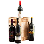 Four Bottles Of Red Wine in a Crate