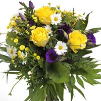 Bouquet of yellow roses and purple eustoma with at...