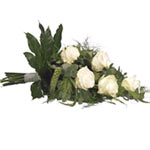 Stylish and beautiful bouquet with white roses and seasonal greens. ...