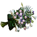 A funeral bouquet that exudes life, with hot of white lilies, white roses, blue ...