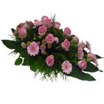 This funeral bouquet decorated with pink roses and germini santini. ...