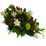 This funeral decoration with red germini red roses and green Anastasia. ...