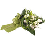  Full of hope and light.This sad bouquet composed of spring flowers such as tuli...