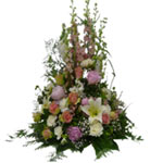 Standing funeral decoration with pink roses, pink larkspur, white lilies, white ...